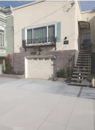 a view of a house with a patio