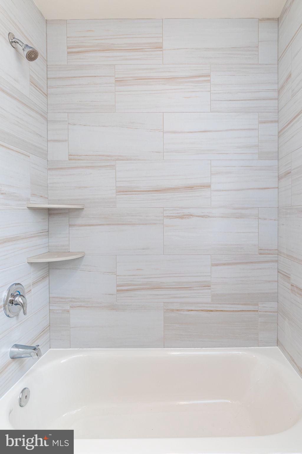 8 South Reed Street Bel Air, MD 21014 - Photo 10 of 21 a bathroom with a bathtub