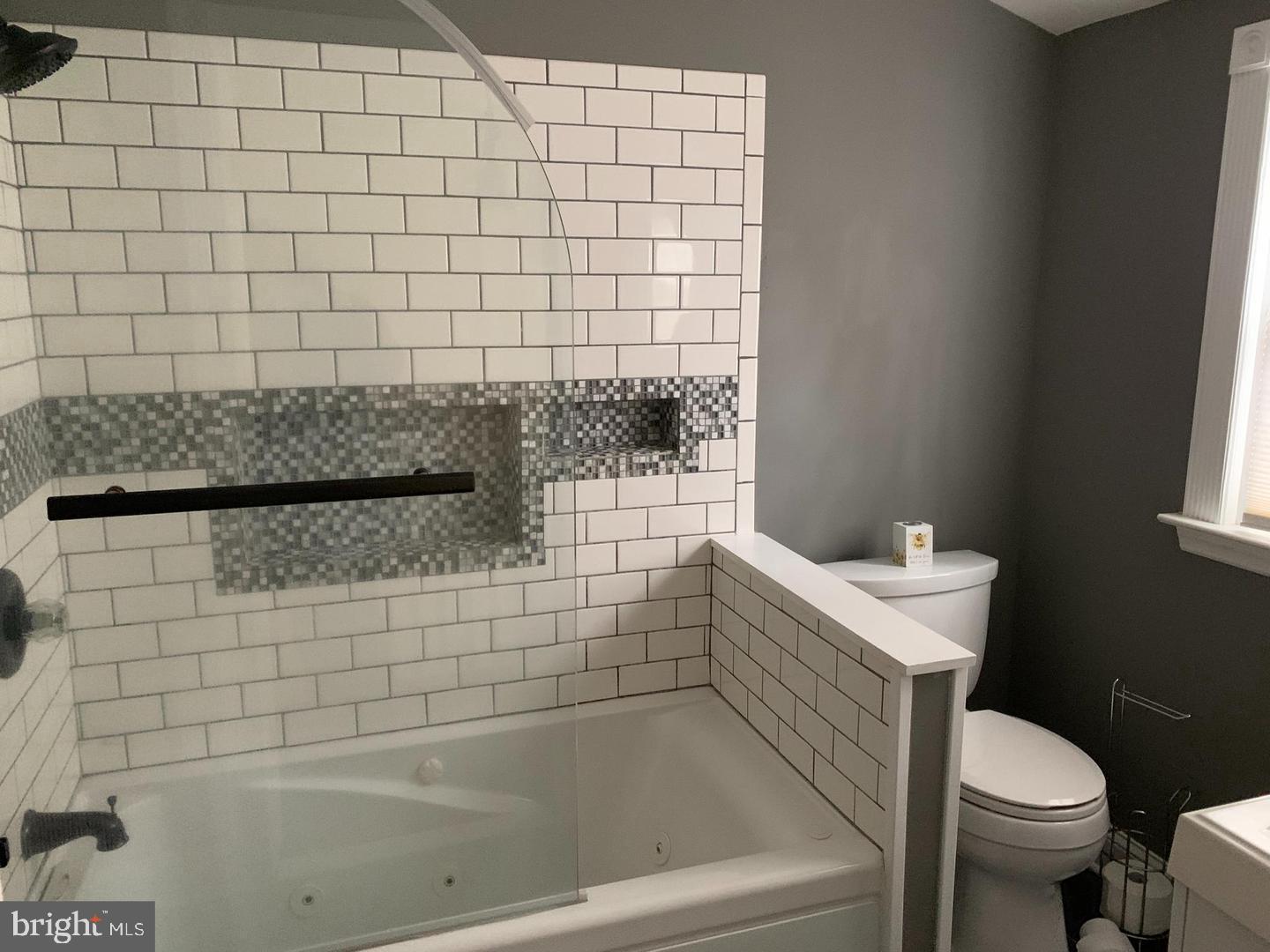 30 Upper Ferry Road Ewing, NJ 08628 - Photo 11 of 12 a bathroom with a toilet and a bathtub