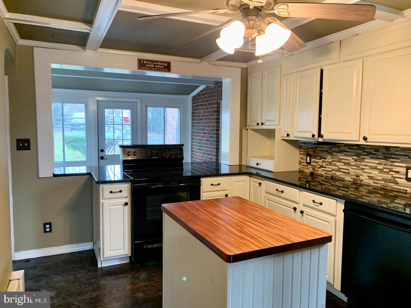30 Upper Ferry Road Ewing, NJ 08628 - Photo 5 of 12 a kitchen with stainless steel appliances granite countertop a stove a sink and a refrigerator