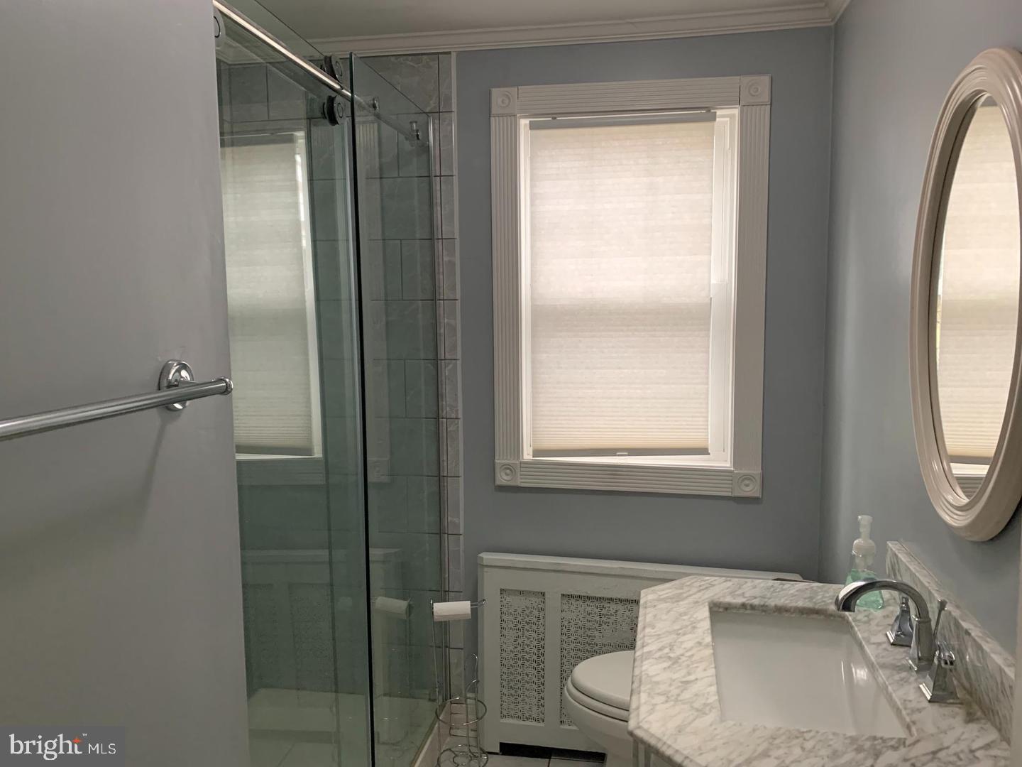 30 Upper Ferry Road Ewing, NJ 08628 - Photo 8 of 12 a bathroom with a sink toilet and shower