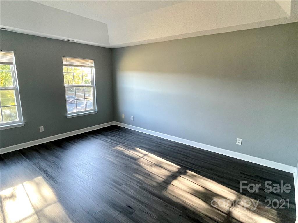 5514 Rogers Road Indian Trail, NC 28079 - Photo 19 of 34 wooden floor in an empty room with a window