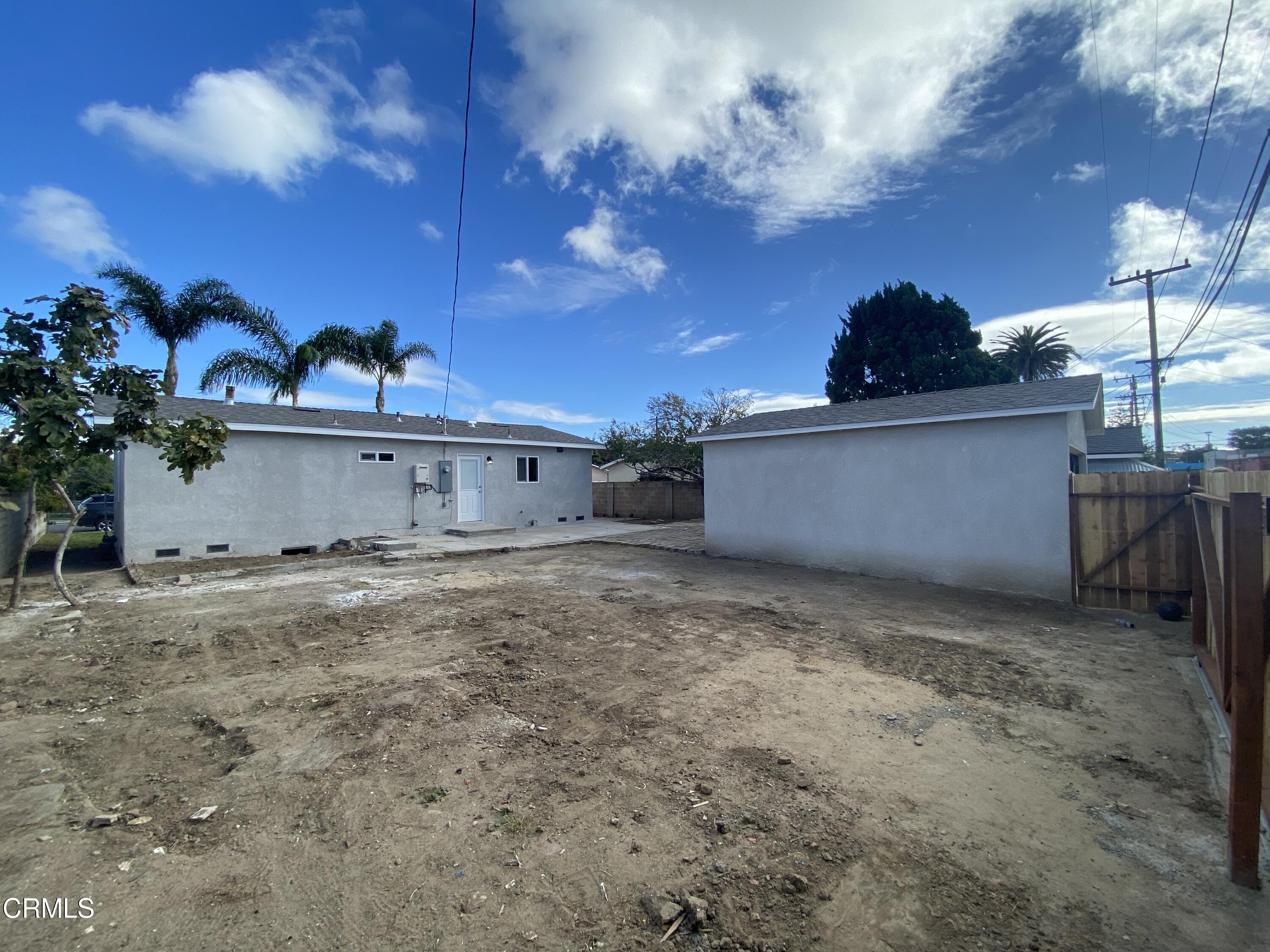 4931 Refsing Place Oxnard, CA 93033 - Photo 6 of 16 a view of a house with a garage
