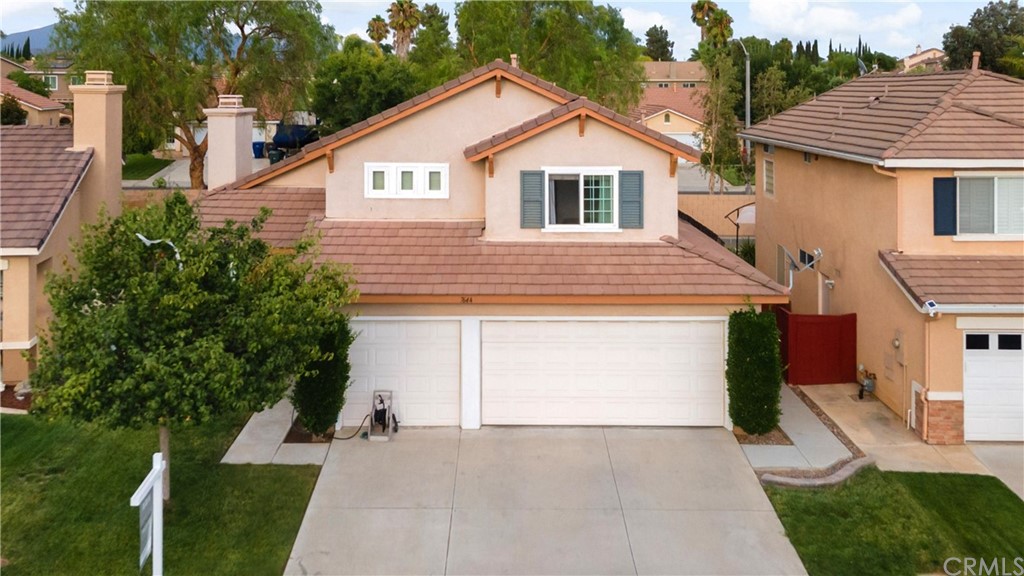 7644 Canberra Way Riverside, CA 92508 - Photo 1 of 1 a view of a house with a yard