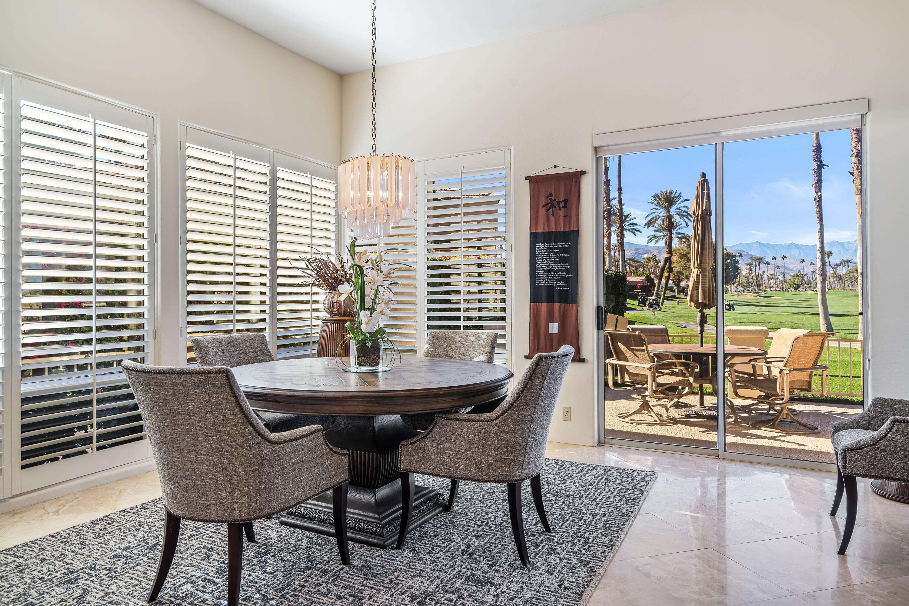 75762 Vista Del Rey Indian Wells, CA 92210 - Photo 16 of 49 a dining room with furniture and window