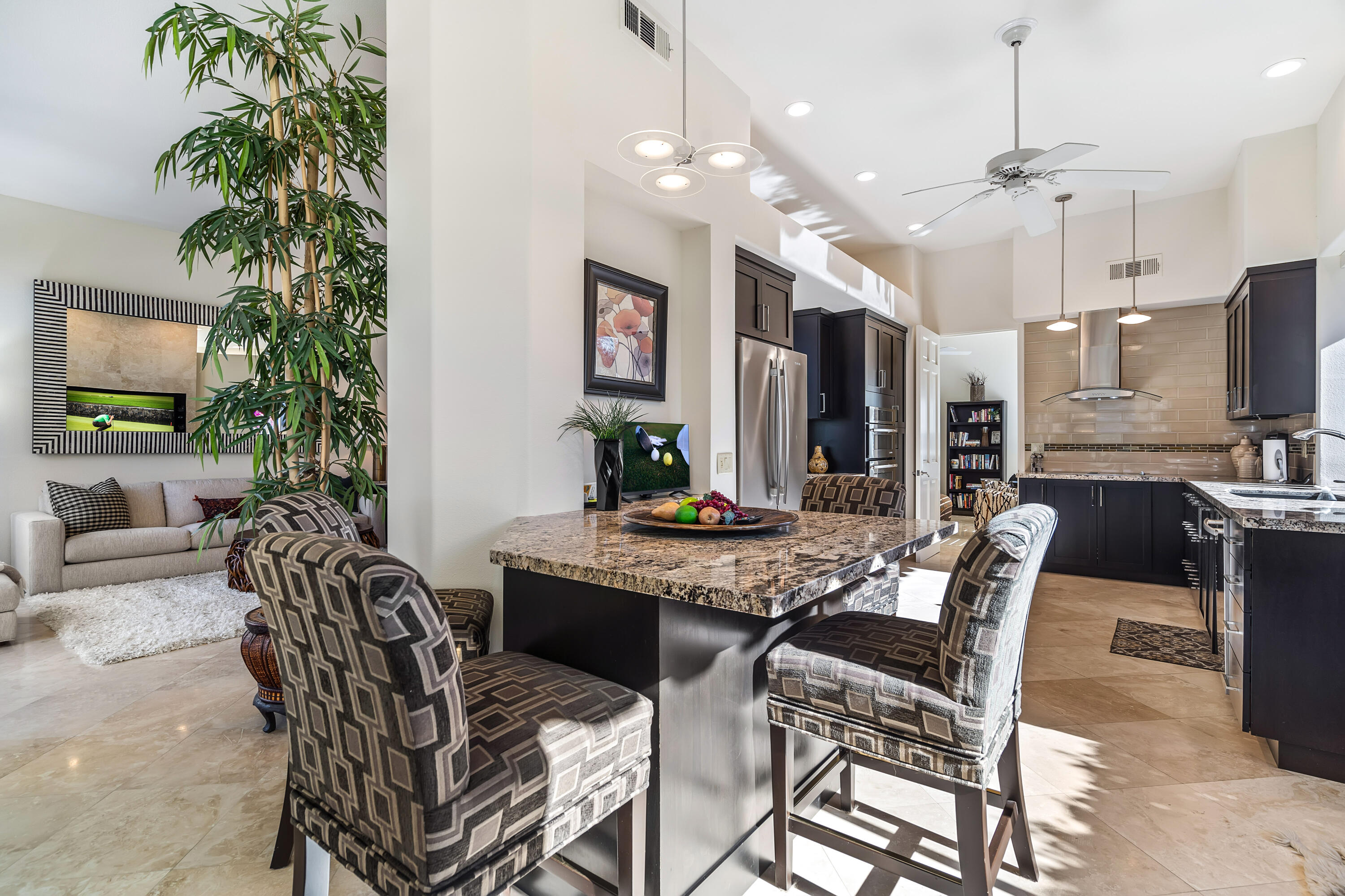 75762 Vista Del Rey Indian Wells, CA 92210 - Photo 20 of 49 a view of a dining room with furniture