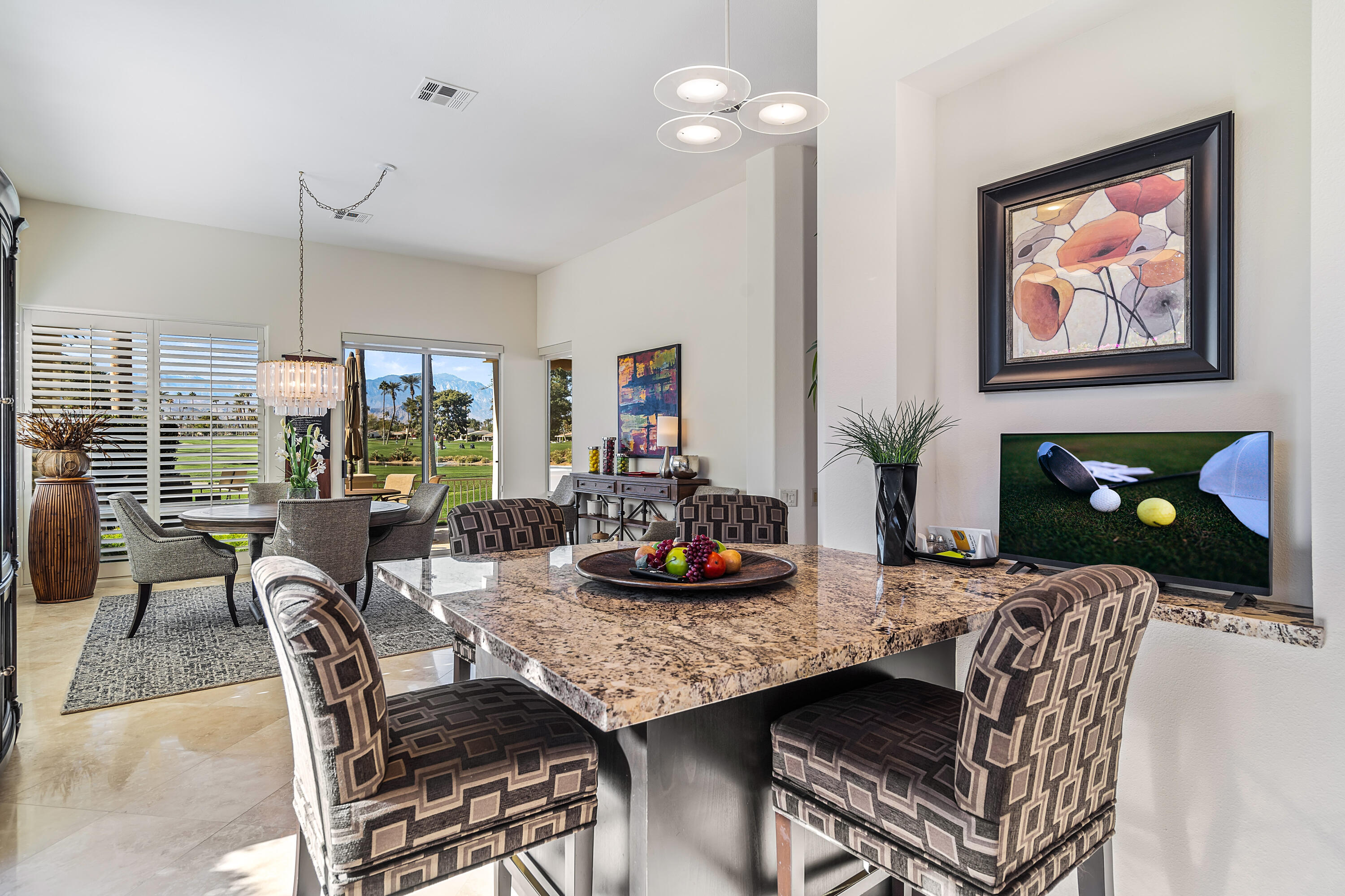 75762 Vista Del Rey Indian Wells, CA 92210 - Photo 21 of 49 a view of a dining room with furniture window and outside view