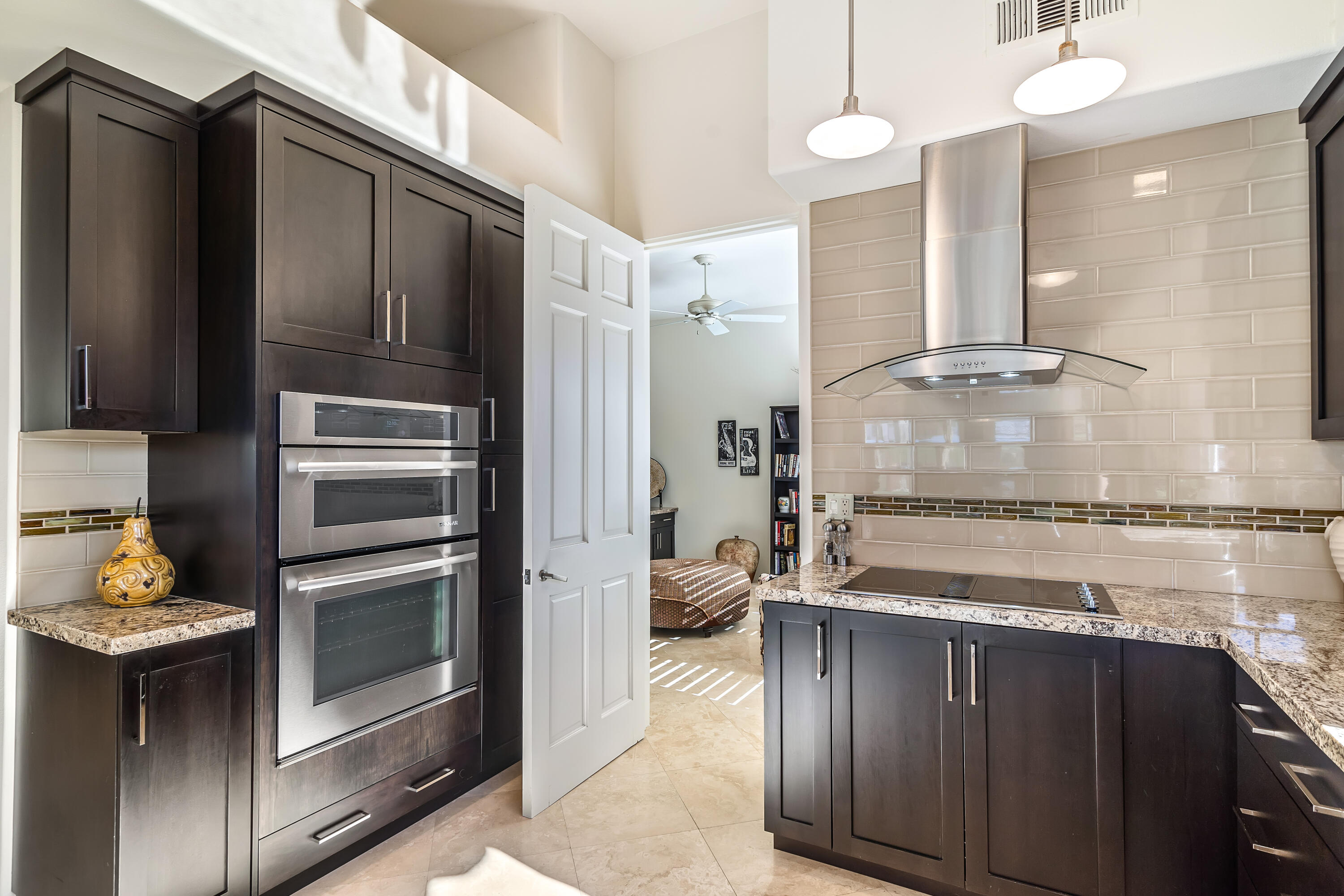 75762 Vista Del Rey Indian Wells, CA 92210 - Photo 25 of 49 a kitchen with stainless steel appliances granite countertop a refrigerator and a stove