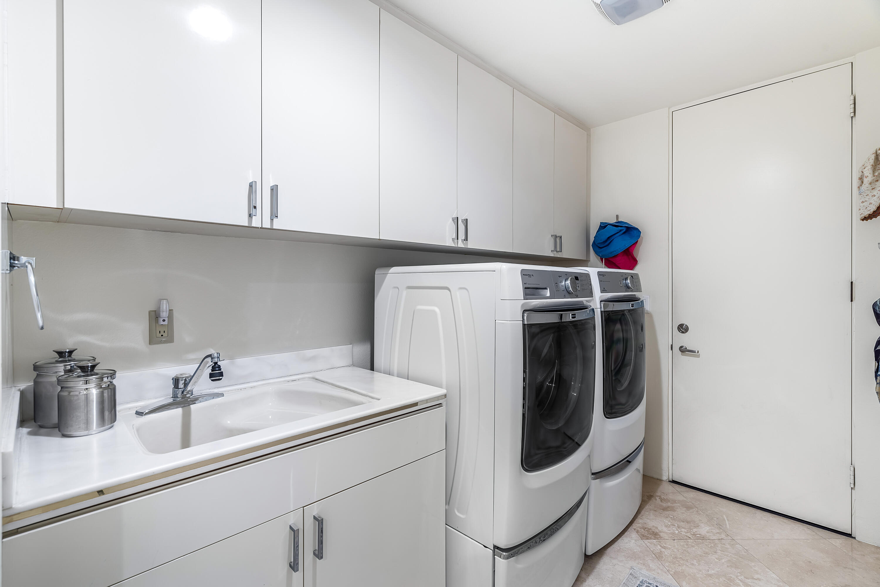 75762 Vista Del Rey Indian Wells, CA 92210 - Photo 41 of 49 a utility room with sink dryer and washer