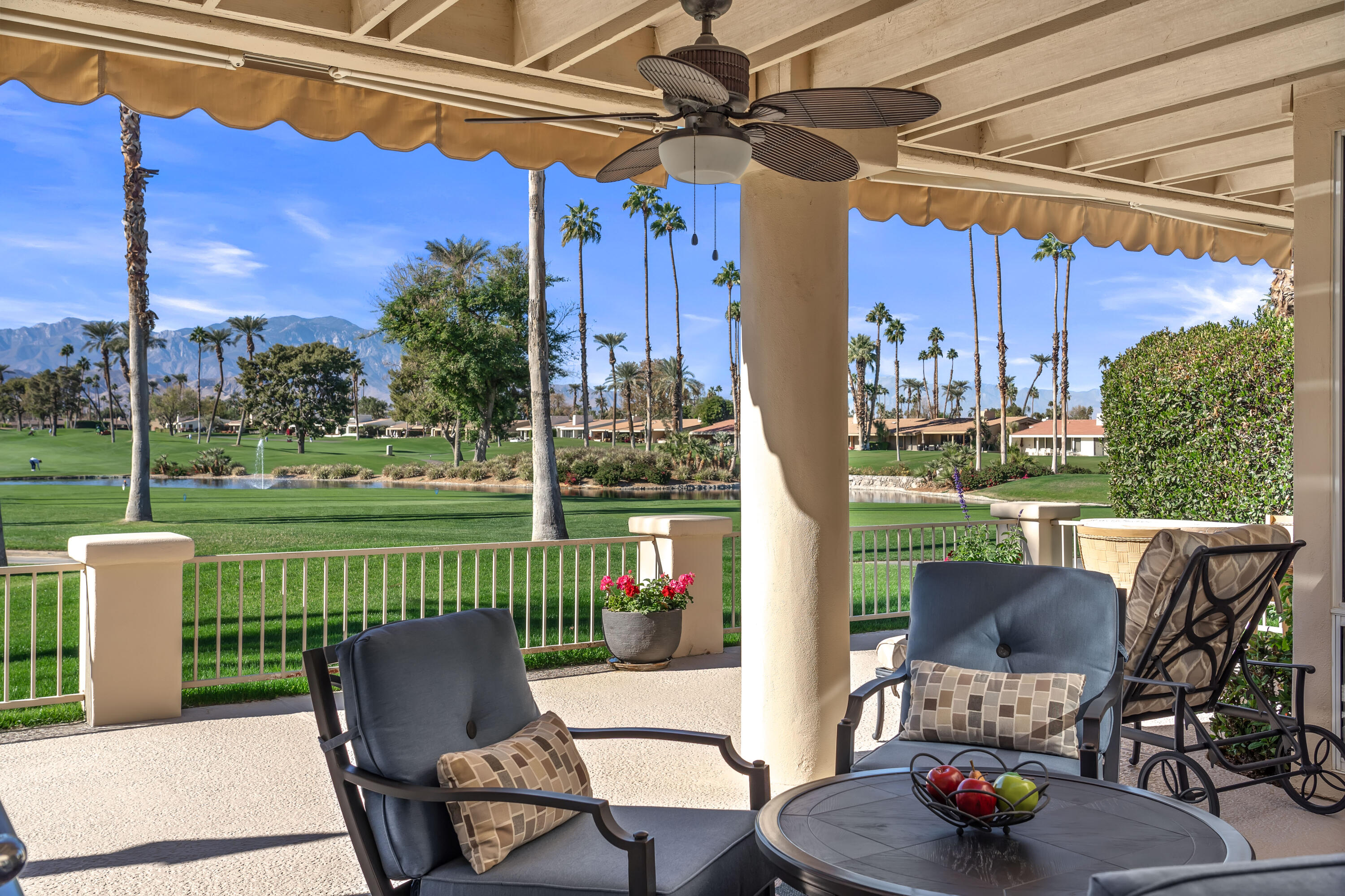 75762 Vista Del Rey Indian Wells, CA 92210 - Photo 43 of 49 a view of a patio with a table chairs and a table