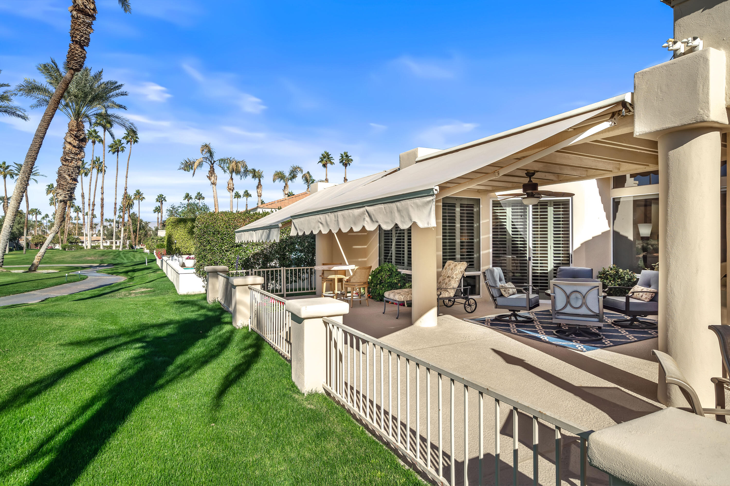 75762 Vista Del Rey Indian Wells, CA 92210 - Photo 46 of 49 a view of a house with backyard porch and sitting area