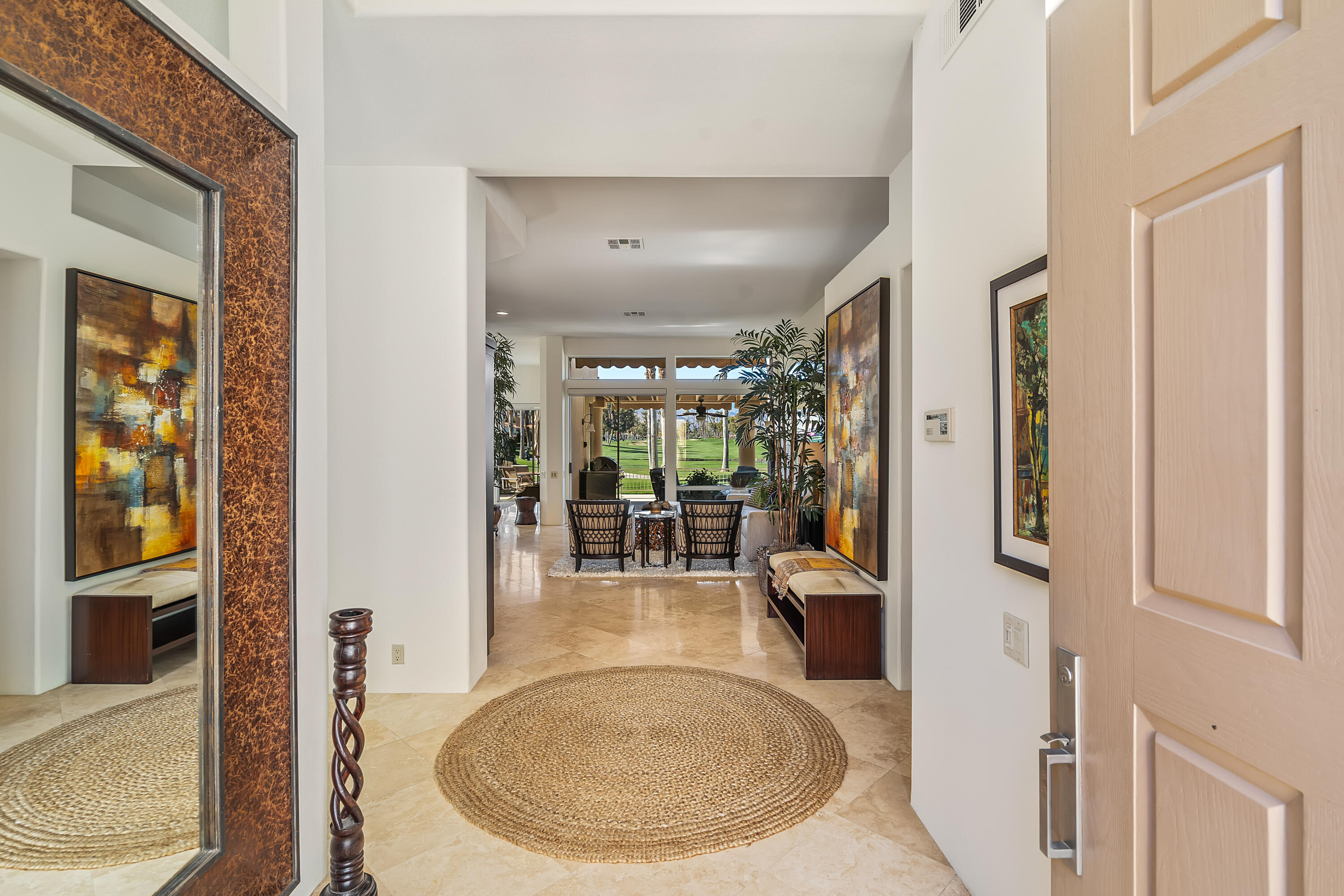 75762 Vista Del Rey Indian Wells, CA 92210 - Photo 8 of 49 a view of a livingroom with furniture and entryway
