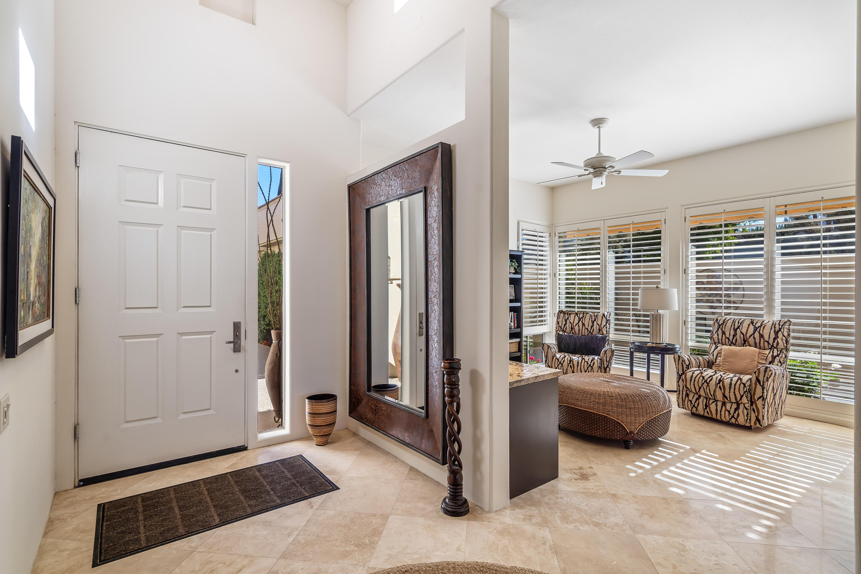 75762 Vista Del Rey Indian Wells, CA 92210 - Photo 9 of 49 a living room with furniture and a flat screen tv