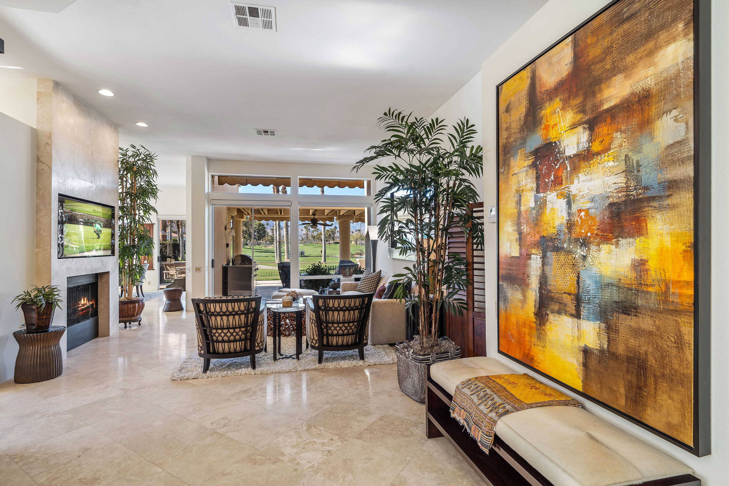75762 Vista Del Rey Indian Wells, CA 92210 - Photo 10 of 49 a room with lots of furniture and a large window