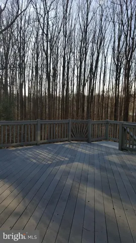 a view of a brick house with many windows