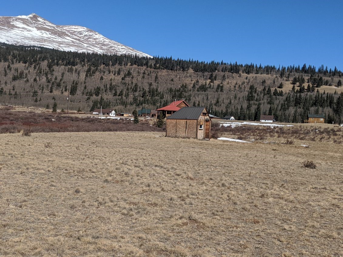140 Kootchie Kootchie Road Alma, CO 80420 - Photo 20 of 22 a view of a dry yard with wooden fence