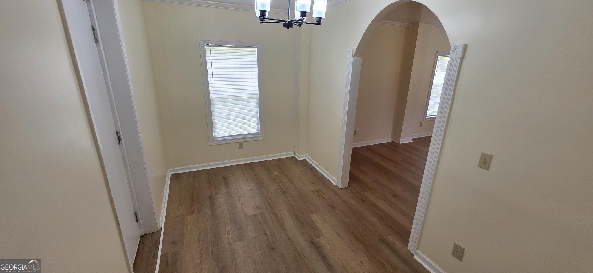 657 Tom McKinley Road Thomaston, GA 30286 - Photo 15 of 32 wooden floor in an empty room