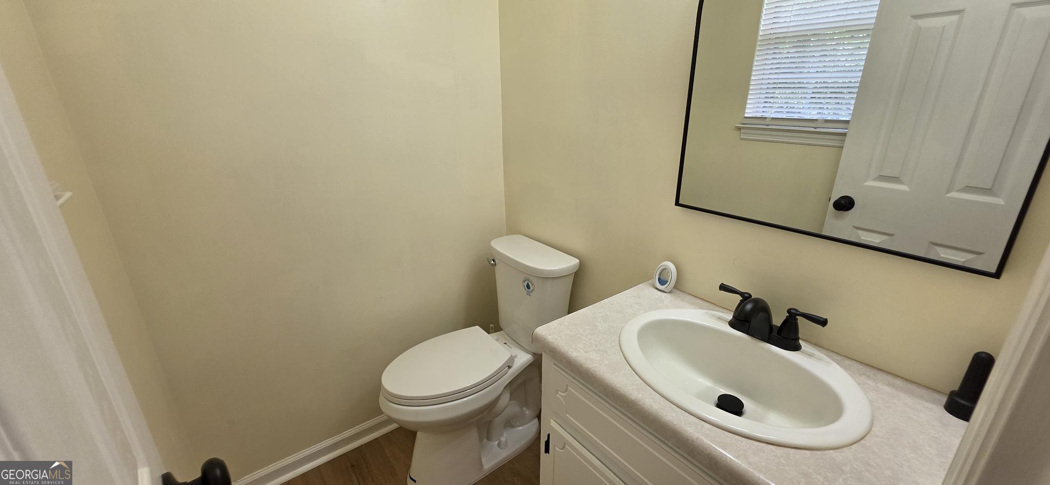 657 Tom McKinley Road Thomaston, GA 30286 - Photo 30 of 32 a bathroom with a sink and a toilet