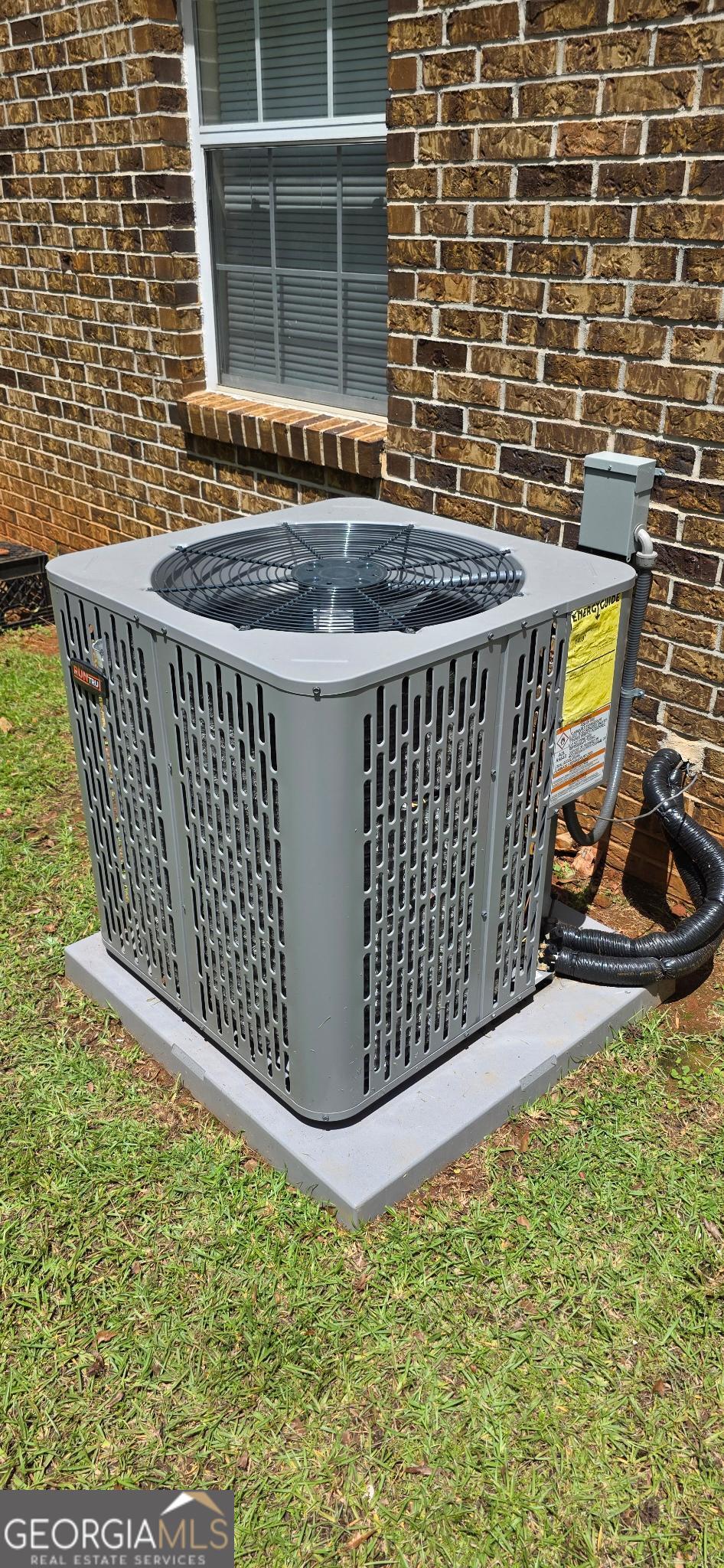 657 Tom McKinley Road Thomaston, GA 30286 - Photo 6 of 32 a view of outdoor space with barbeque grill and brick wall