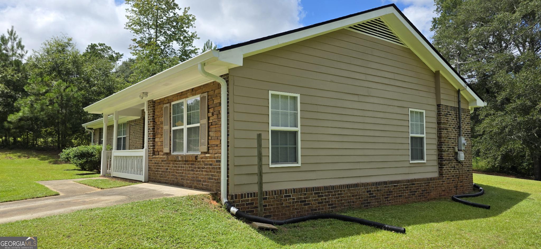657 Tom McKinley Road Thomaston, GA 30286 - Photo 9 of 32 a view of a house with a yard