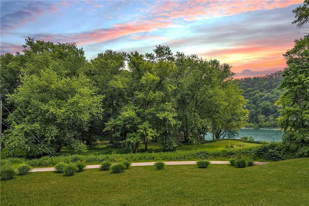 1150 River Road Freeport, PA 16229 - Photo 4 of 16 a view of a golf course with a lake