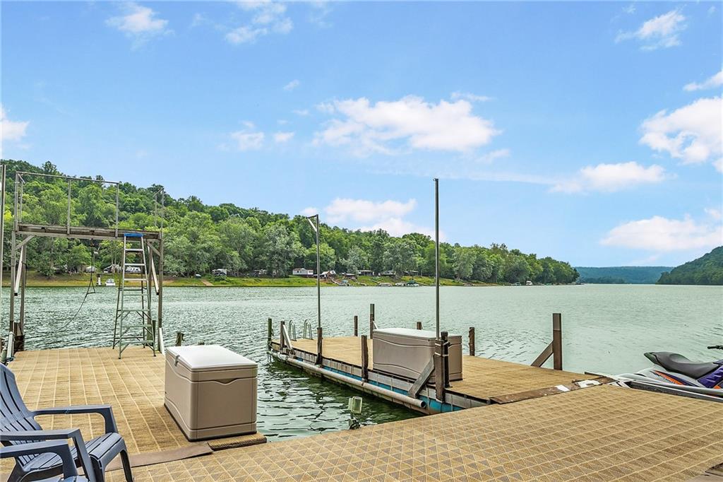 1150 River Road Freeport, PA 16229 - Photo 6 of 16 a view of a lake with couches in the patio