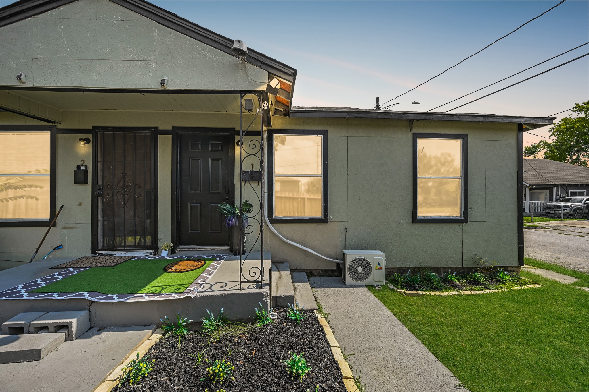 3705 Bremond Street, Unit 1 Houston, TX 77004 - Photo 1 of 14 a front view of a house with garden