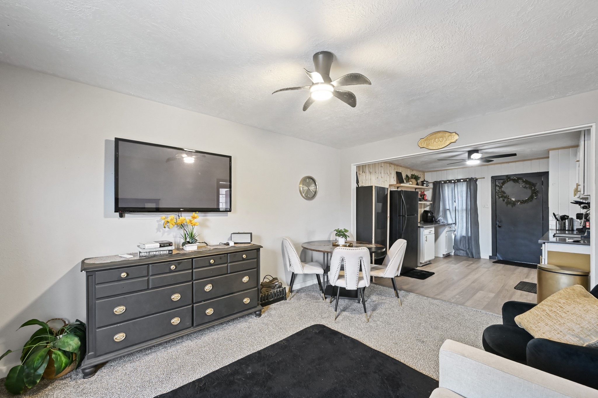 3705 Bremond Street, Unit 1 Houston, TX 77004 - Photo 12 of 14 a living room with furniture and a flat screen tv
