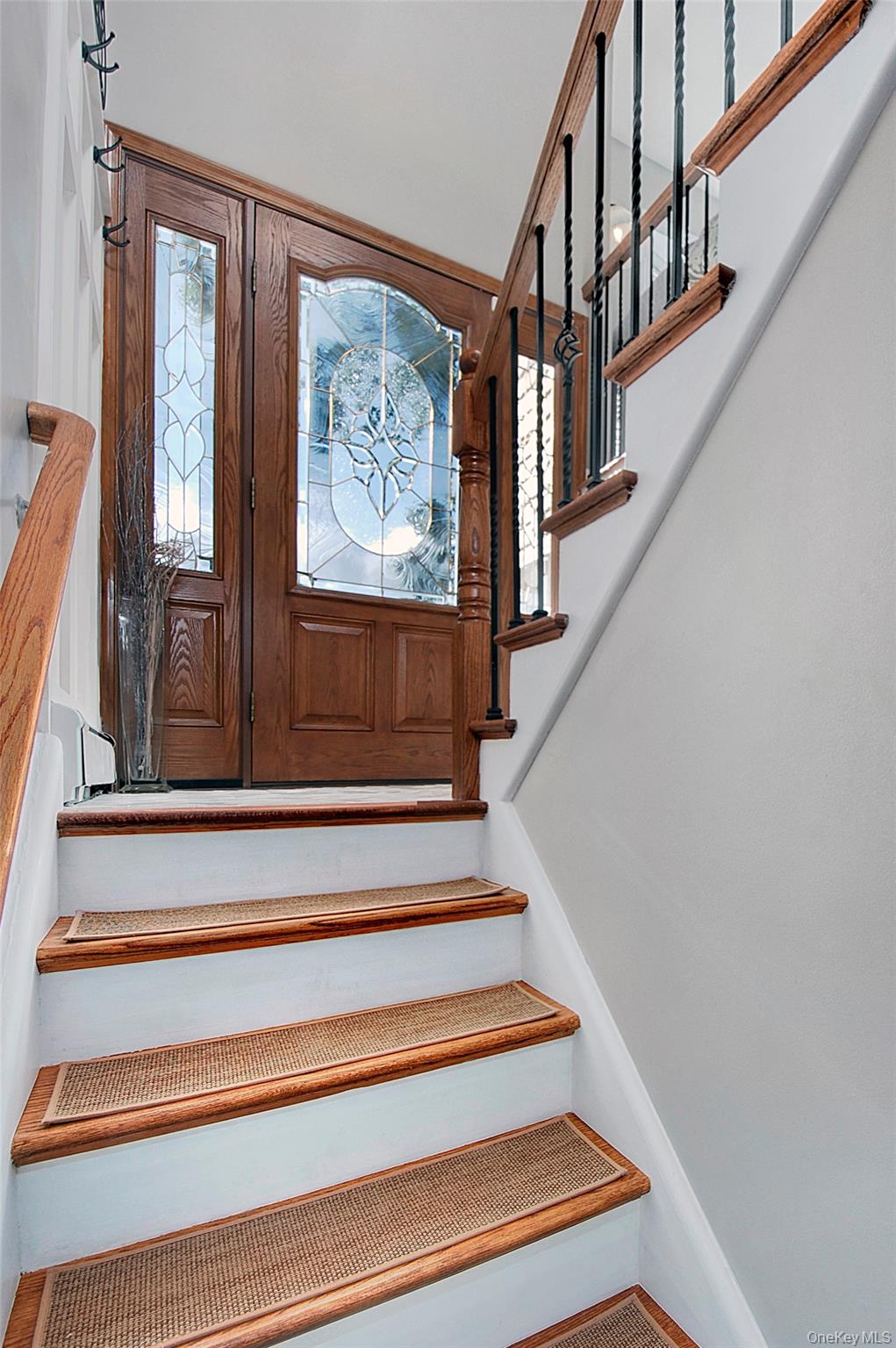 9 Prospect Place Suffern, NY 10901 - Photo 4 of 13 a view of staircase with wooden floor and a front door