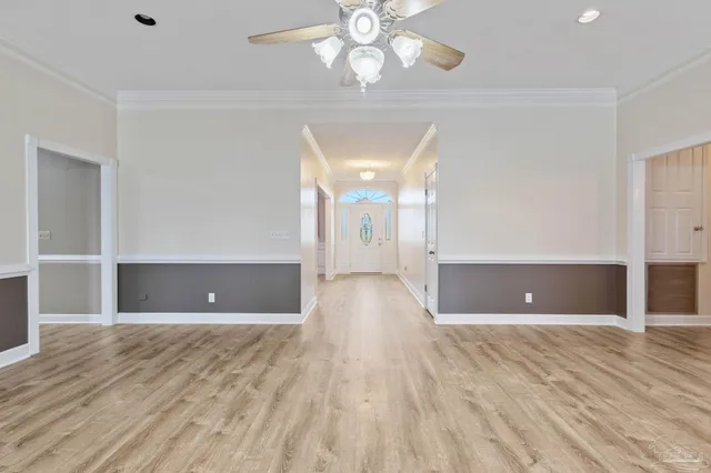 a kitchen with granite countertop a sink and cabinets