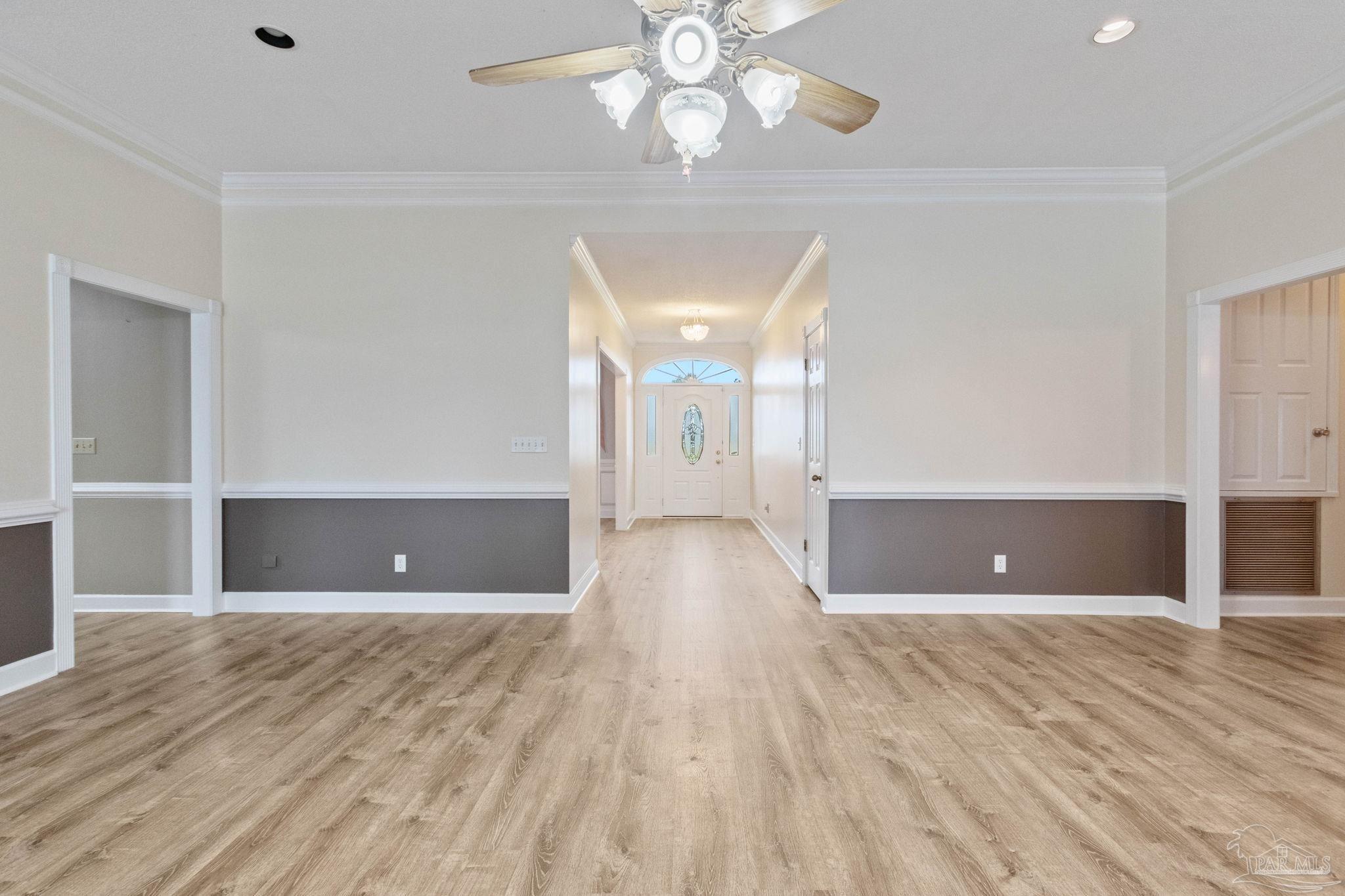 10734 Highway 31 Atmore, AL 36502 - Photo 8 of 65 a view of empty room with wooden floor