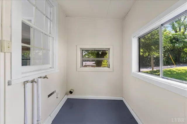 an empty room with windows