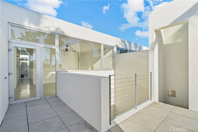 a view of hallway with bathroom