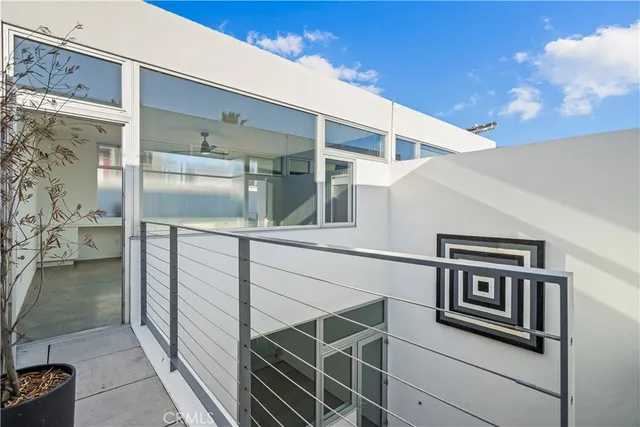 a view of a ocean with city from a terrace