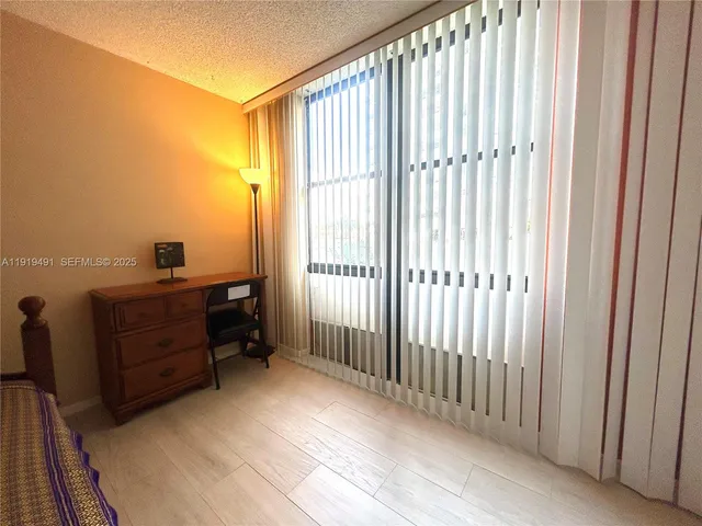 wooden floor and window in a room