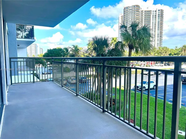 a view of a balcony with city view