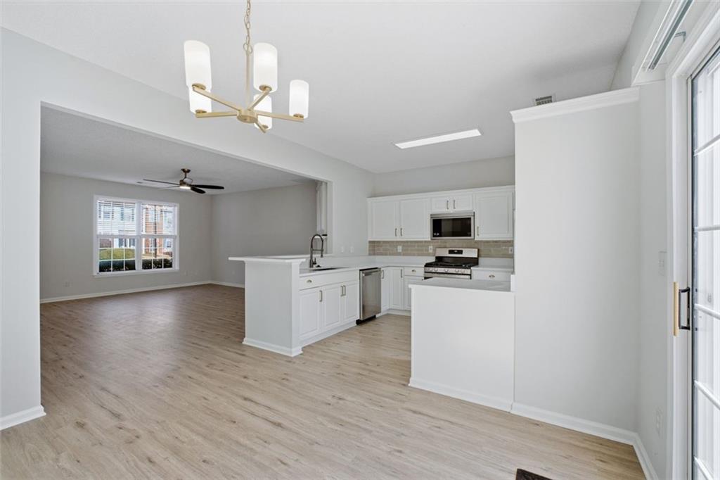 5764 Reps Trace Norcross, GA 30071 - Photo 12 of 32 a view of kitchen with sink and refrigerator