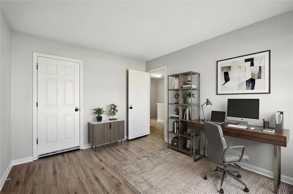 5764 Reps Trace Norcross, GA 30071 - Photo 26 of 32 a view of a workspace with furniture and a window