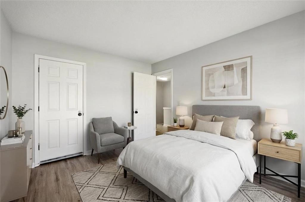 5764 Reps Trace Norcross, GA 30071 - Photo 28 of 32 a bedroom with a bed and a couch