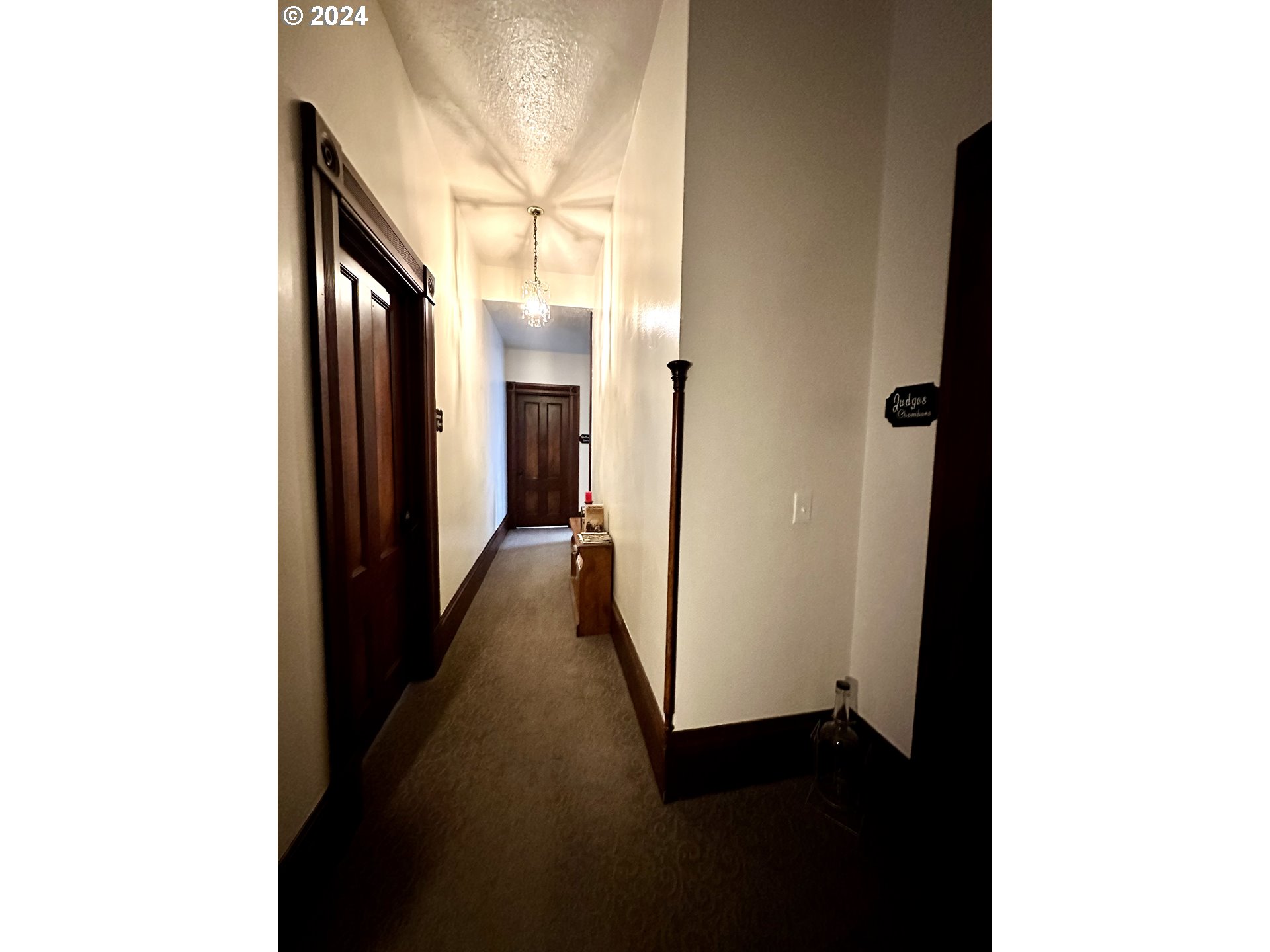1790 Washington Avenue Baker City, OR 97814 - Photo 30 of 42 a view of a hallway with a white walls