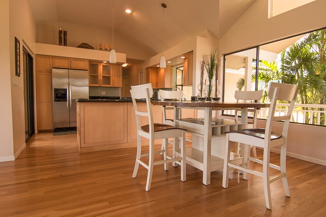 60 Oili Road Haiku, HI 96708 - Photo 11 of 30 a dining hall with stainless steel appliances granite countertop a stove and a refrigerator