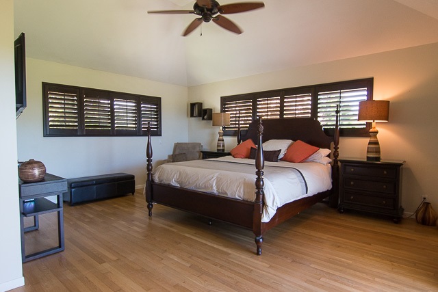 60 Oili Road Haiku, HI 96708 - Photo 14 of 30 a bedroom with a bed and a window