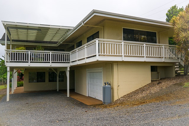 60 Oili Road Haiku, HI 96708 - Photo 28 of 30 a view of a house with wooden deck