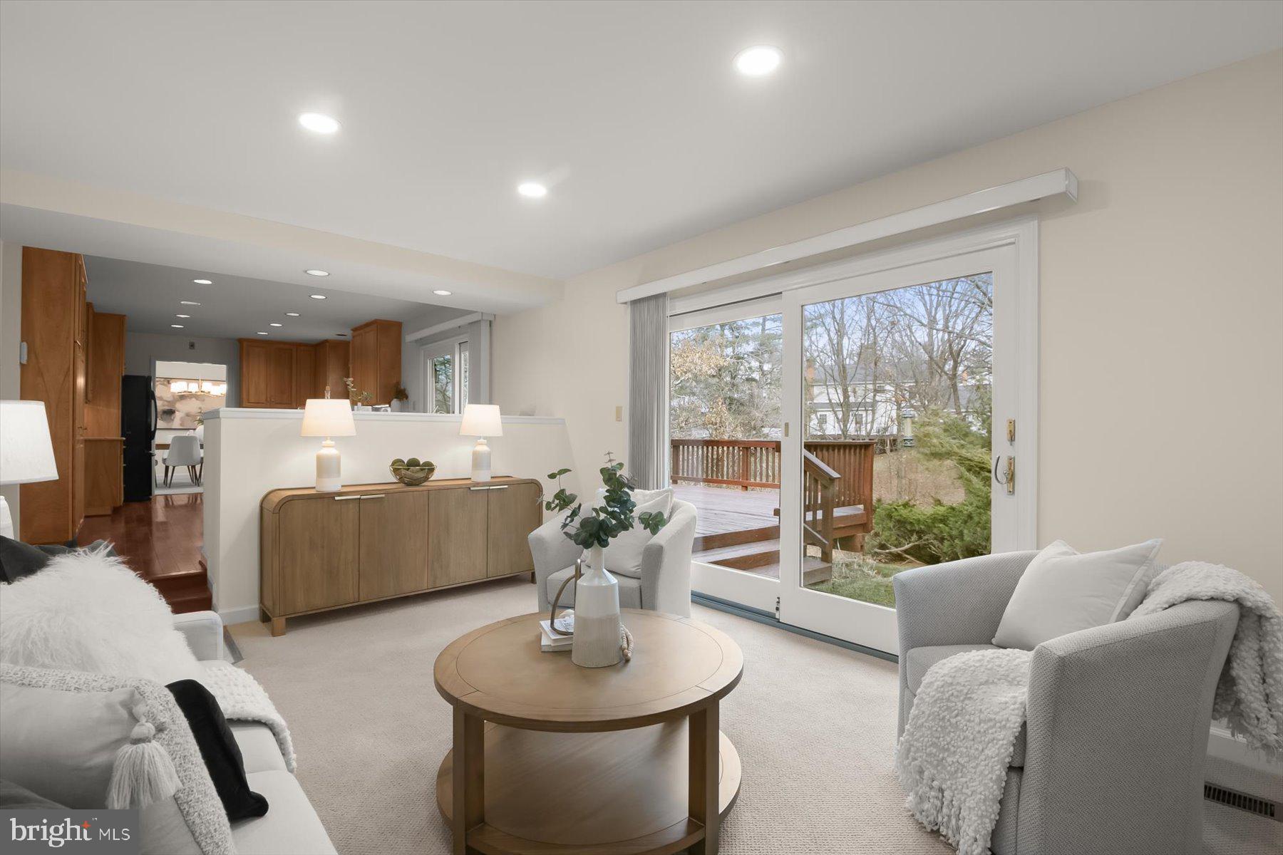 1727 Glastonberry Road Potomac, MD 20854 - Photo 17 of 45 a living room with furniture and a large window
