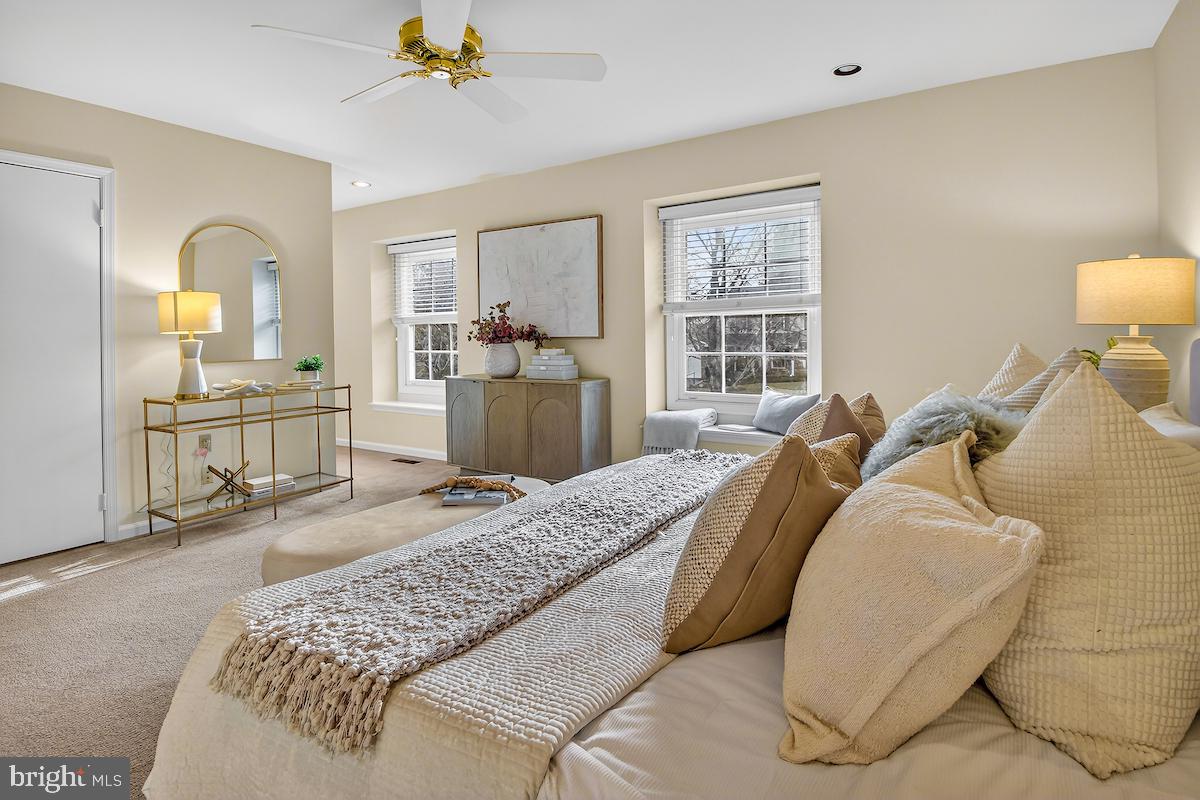 1727 Glastonberry Road Potomac, MD 20854 - Photo 27 of 45 a living room with furniture and a large window