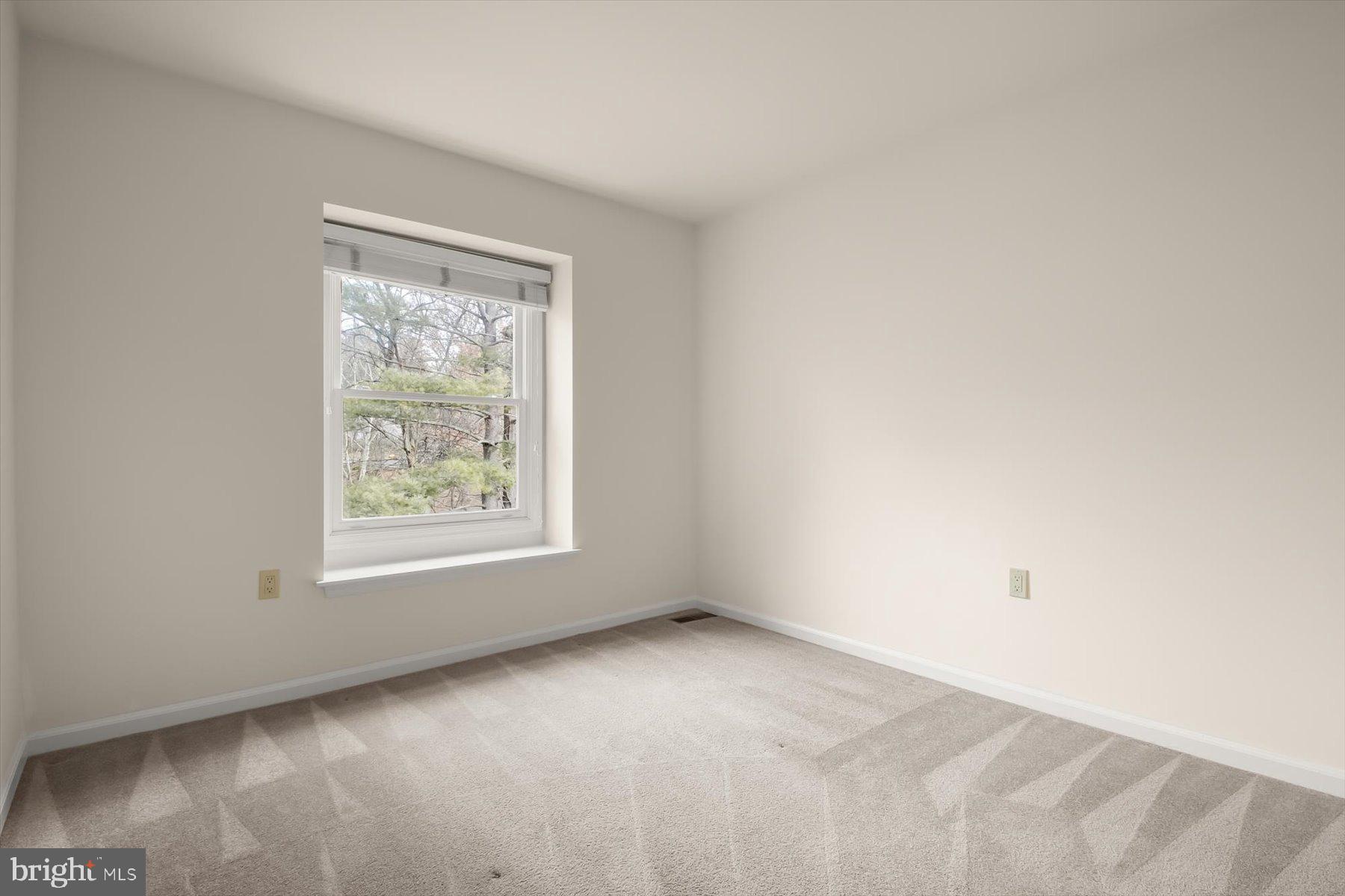 1727 Glastonberry Road Potomac, MD 20854 - Photo 36 of 45 an empty room with a window