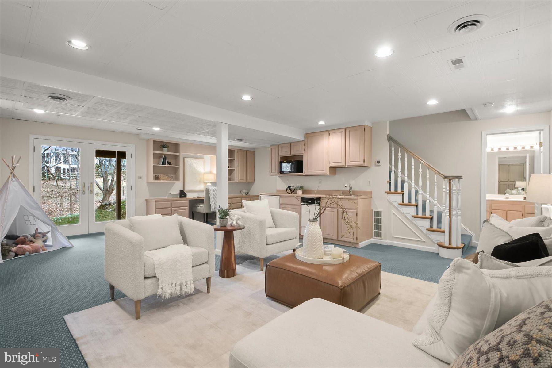 1727 Glastonberry Road Potomac, MD 20854 - Photo 38 of 45 a living room with furniture and a view of kitchen