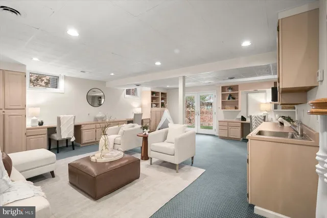 a workspace with furniture and window