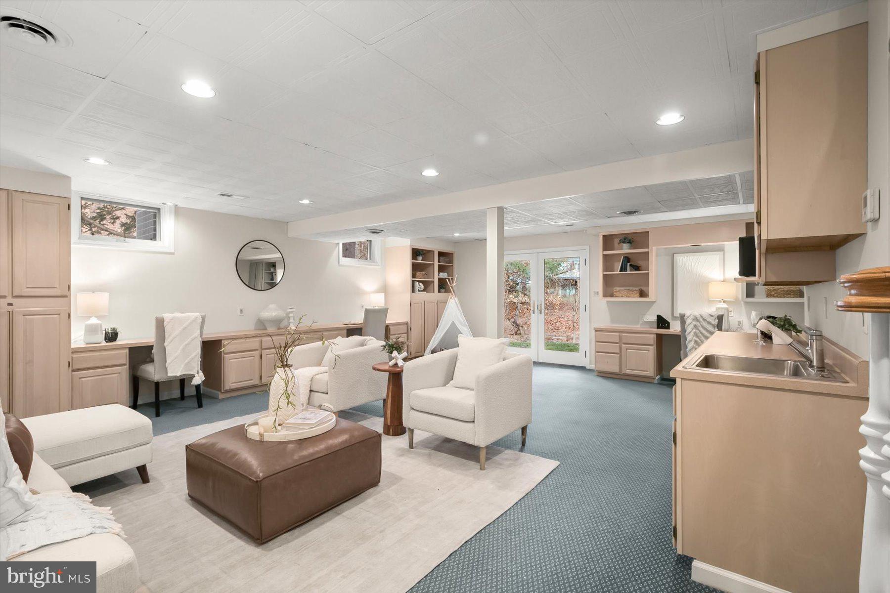 1727 Glastonberry Road Potomac, MD 20854 - Photo 39 of 45 a living room with furniture and a large window