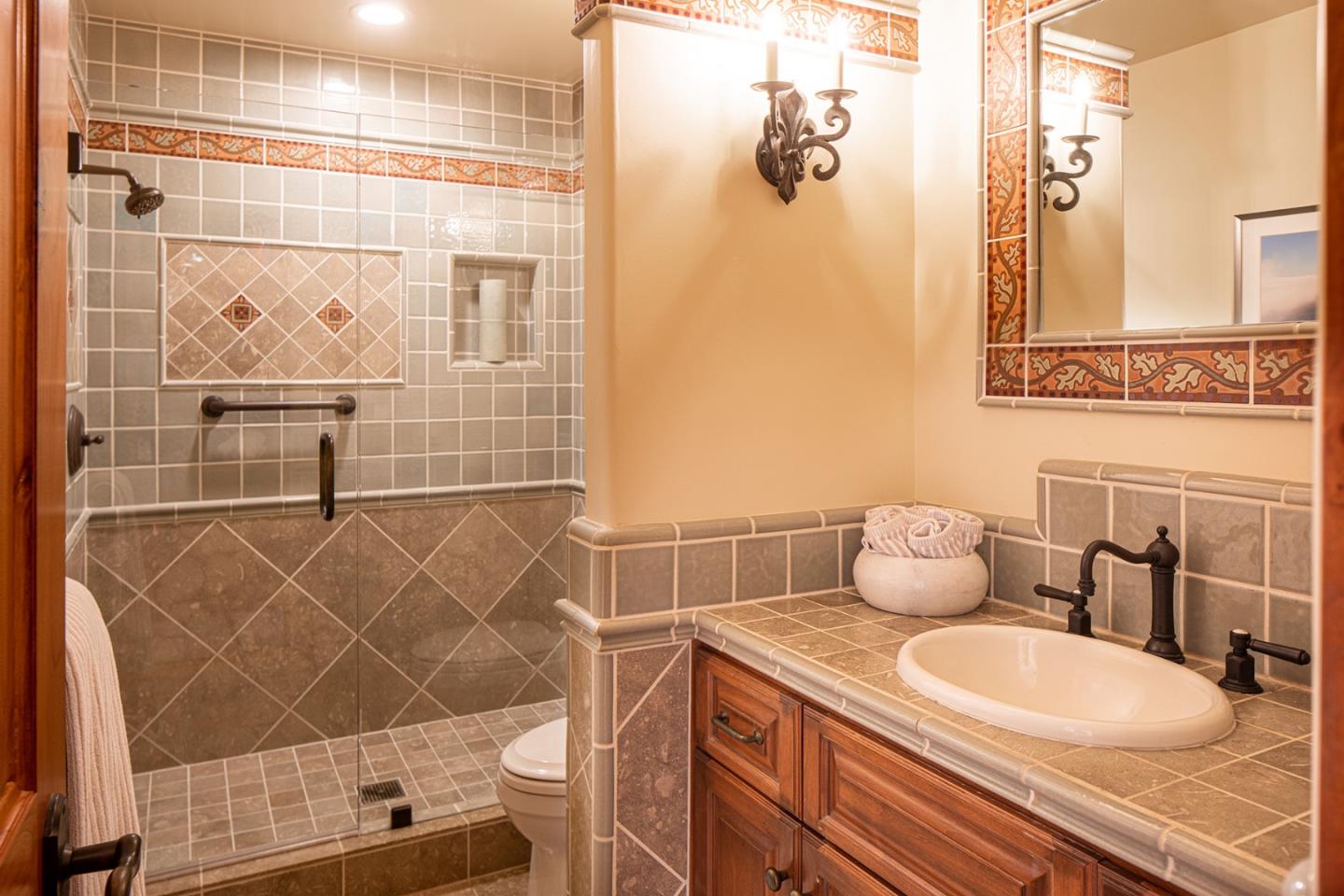 9546 Maple Court Carmel, CA 93923 - Photo 16 of 27 a bathroom with a sink and toilet